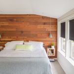 Decorare le pareti con il legno in camera da letto