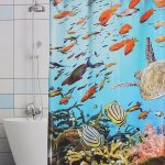 Pesce e tartaruga su una tenda di tessuto