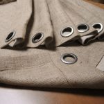 tende realizzate in stuoia con occhielli