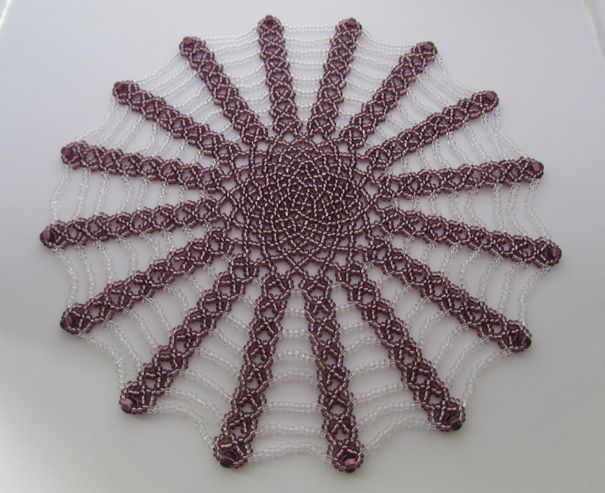 idee di design per tovaglioli con perline