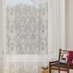 Tulle di cotone con ornamento ricamato