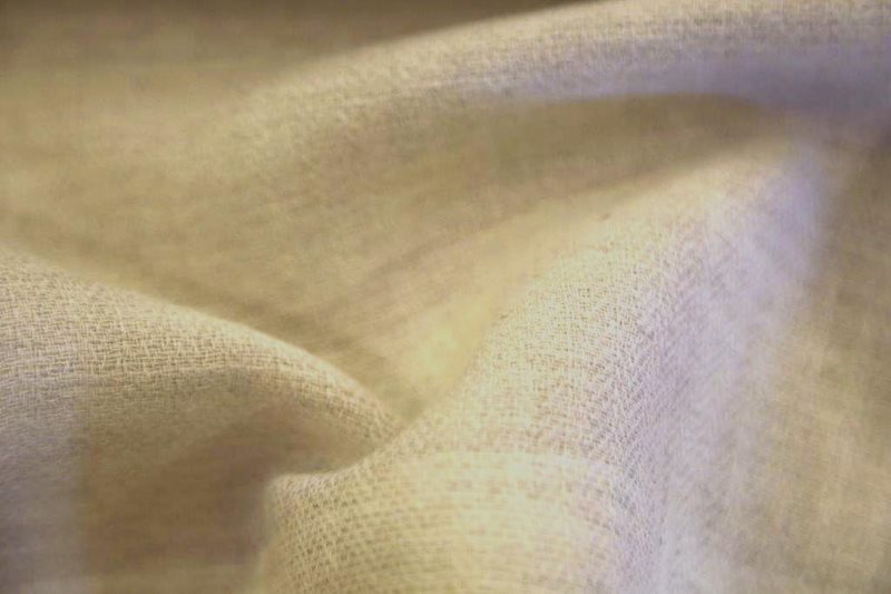 Tulle spesso in lana naturale