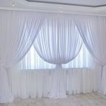 Doppie tende di voile bianco