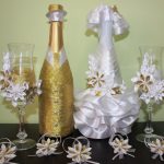 decorazione di bottiglie di champagne per matrimonio