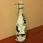 Decorazione con bottiglia di champagne per foto di nozze