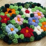 decorazione del tappeto con pompon