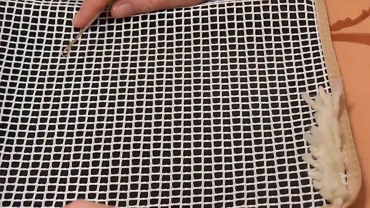 maglia da ricamo per tappeti