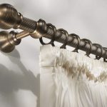 fissaggio delle tende alla cornice decorativa fotografica