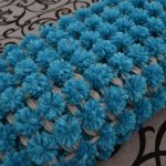 coperta con pompon