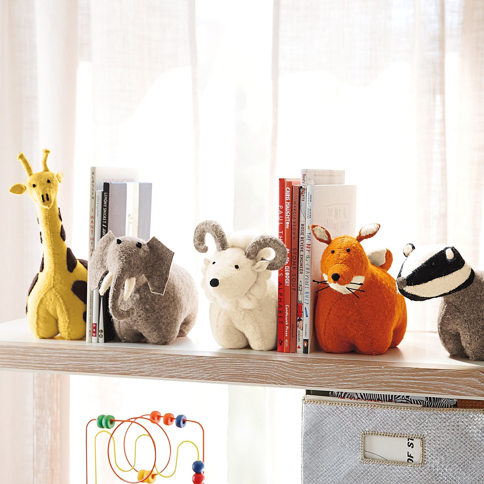 supporto porta libri giocattoli