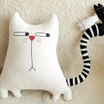 tipi di foto di gatti con cuscino