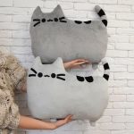 idee di design per cuscini a forma di gatto
