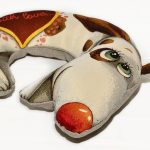 cuscino decorativo a forma di cane