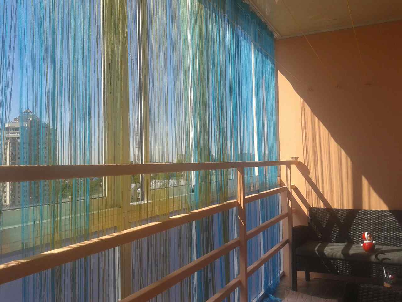 tende sul balcone in mussola