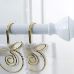 design di aste per tende a parete
