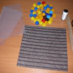Tappeto fai da te con coperchi, foto del design
