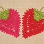 design fotografico di una presina a forma di fragola