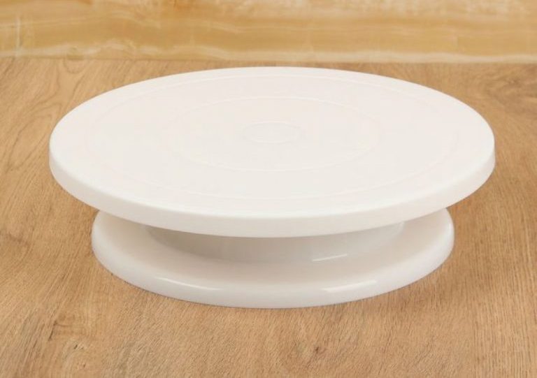 supporto girevole per torte in plastica