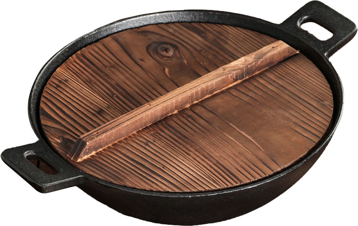 calderone in ghisa con coperchio in legno