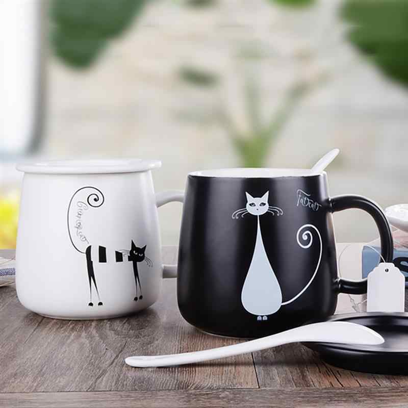 tazze di ceramica con gatti